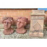 A chimney pot and two large resin planters in the form of heads