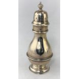 A silver baluster shaped sugar caster, 4oz, London 1906