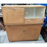 A 1950's light oak kitchen cabinet