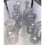A selection of 8 cut glass decanters