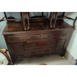 A late 19th early 20th Century mahogany sideboard with four drawers, two cupboards with Art
