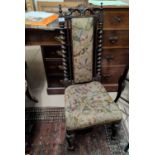 A Victorian walnut occasional chair with high back and barley twist side columns, on turned legs,