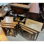 A nest of 3 walnut occasional tables; a nest of 3 oak occasional tables; an oak drop leaf occasional