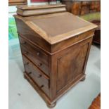 A 19th century walnut Davenport desk with hinged rear correspondence box, slope front with inset
