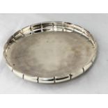 A David Anderson silver shallow dish with pie crust edge and 3 feet, marked D A S830 to the base,