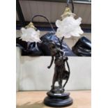 An Art Nouveau style table lamp with 2 branches in the form of a bronzed female figure