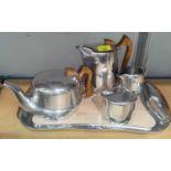 A Picquot ware 4 piece tea service with tray, polished hardwood mounts