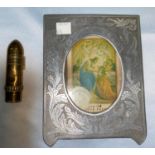 A Trench Art cigarette lighter in the form of a small shell & a similar aluminium photo frame