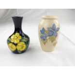 A small bulbous slender neck Moorcroft vase decorated with primroses, impressed & monogrammed height