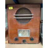A 1930's walnut framed ULTRA mains radio (knob missing)