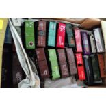 A large selection of American railroad box - cars, various marques