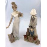 A large Lladro figure: girl with puppy and parasol, height 35cm; a large Lladro figure : girl with