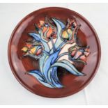 A Moorcroft Tulip plate diameter 26cm