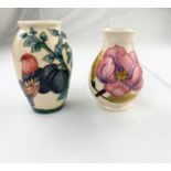 A Moorcroft bird & plum design ovoid vase impressed & monogrammed height 10cm; a Moorcroft