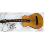 A "Georgian" small acoustic guitar