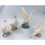 A Nao figure goose with outstretched wings, 3 Nao ducks