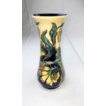 A Moorcroft vase of waisted form decorated in the "Comfrey" pattern designed by Philip Gibson