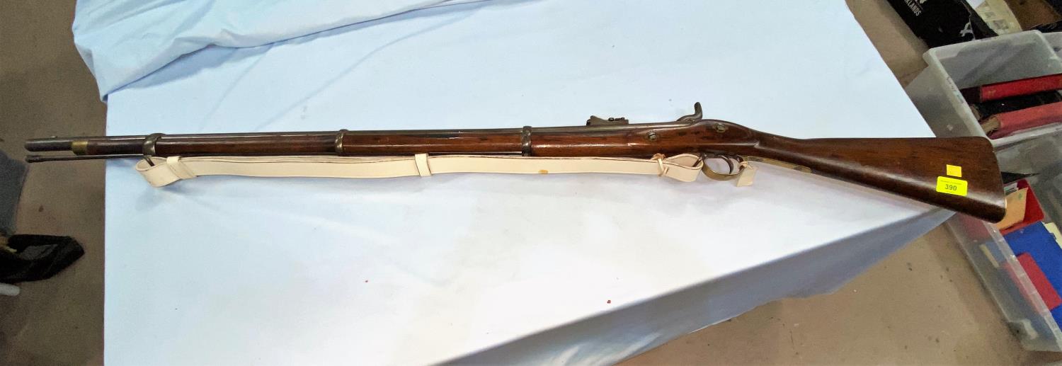 An antique Enfield percussion cap rifle with lock marked Tower 1856, with crown mark V R, length