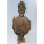 An African tribal carved wood and fabric medicine fetish figure 22cm