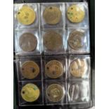 A collection of clocking in tokens from 1890 / 1980