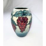 A Moorcroft vase of ovoid form decorated with a grapevine impressed & monogrammed height 13.5cm