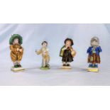 Three Volkstedt figures of children in peasant dress, heights 10 cm; another holding a bust height 9