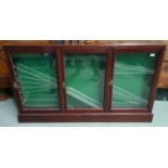 A shop side cabinet with mahogany frame enclosed by 3 doors, width 154 cm, height 90 cm