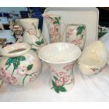 Six Maling ribbed lustre vases; a similar dish decorated with pink flowers; a similar bowl