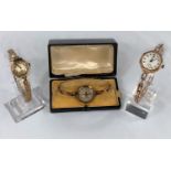 An early 20th century ladies wristwatch on expanding bracelet, stamped '9 ct', gross weight 18.1 gm;