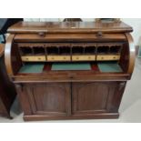A Victorian mahogany, cylinder top bureau with a slide out writing surface & sateen beech lined