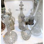 Eight various cut and crystal decanters