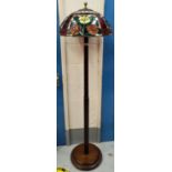 A 1930's oak standard lamp with Tiffany style shade, double fitting (needs re-wiring)