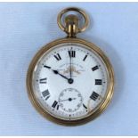 An open faced keyless pocket watch in gold plate, by Thos Russell & Son (dial chipped and glued);