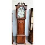 An early 19th century longcase clock with extensive Sheraton style inlay, the arch top hood with