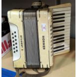 A Hohner 12 base piano accordion "Student II"
