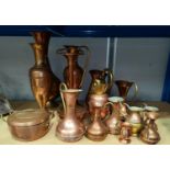 A selection of copper and brass ornaments