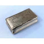 An 18th/19th century rectangular snuff box with chased lid, unmarked, Length 10cm, 3.75oz (118gms)