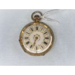 An Edwardian open faced keyless fob watch in yellow chased metal case, with gilded white enamel