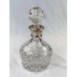 A hallmarked silver and glass decanter by Mappin & Webb, inscription to neck, in original box