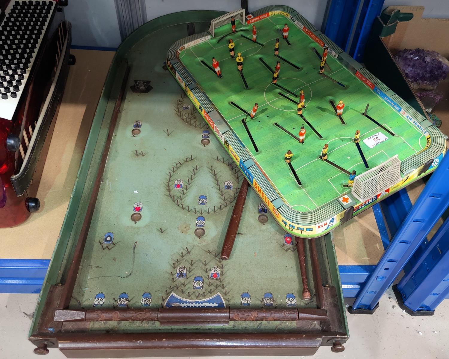 A 1960's tinplate table football game; a bagatelle board