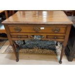 An 18th century crossbanded oak lowboy with 1 long and 2 short drawers, later swan neck handles,
