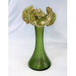 An Art Nouveau green glass vase in the Loetz style with multicoloured and folded rim, height 17