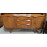 A mid-20th century teak Sutcliffe Todmorden sideboard with 3 central drawers and cupboard to
