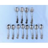 12 Swedish coffee spoons with rose relief terminals. 3.15oz (98gm)