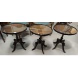 Three reproduction mahogany wine tables on pedestals