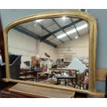 An overmantel mirror in gilt frame