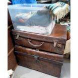 A Victorian tin trunk, a Vulcanide fibre suitcase, a selection of 1930's hand woven wool fabric