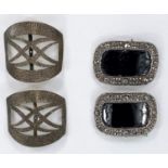 A pair of Georgian cut steel shoe buckles with concealed spring clip, another later pair