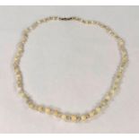A graduated opal bead necklace, 53 beads from 4mm - 9mm, interspersed with small crystal beads,