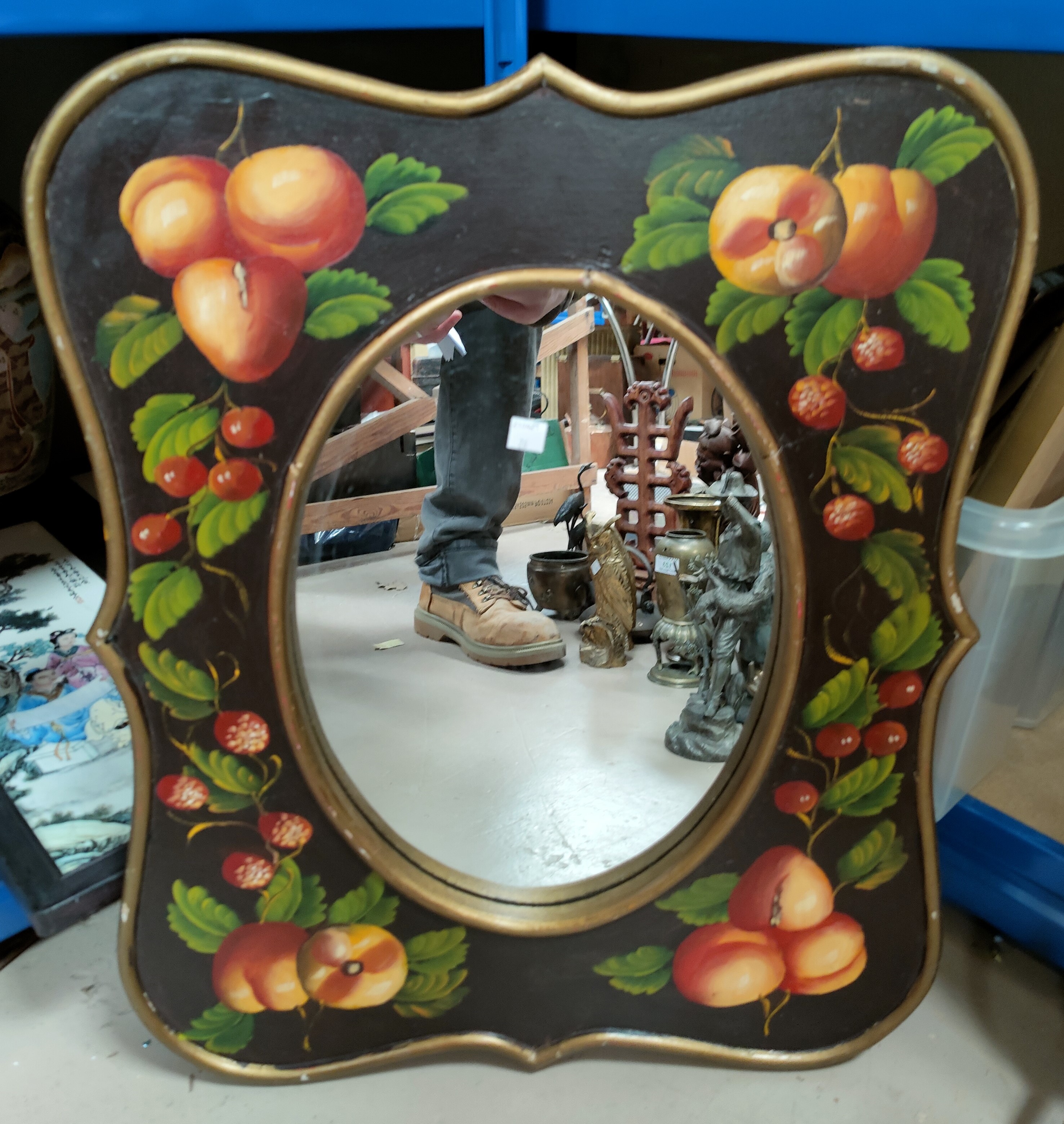 A Victorian oval dressing table mirror in free standing frame (1 hinge replaced); a wall mirror in